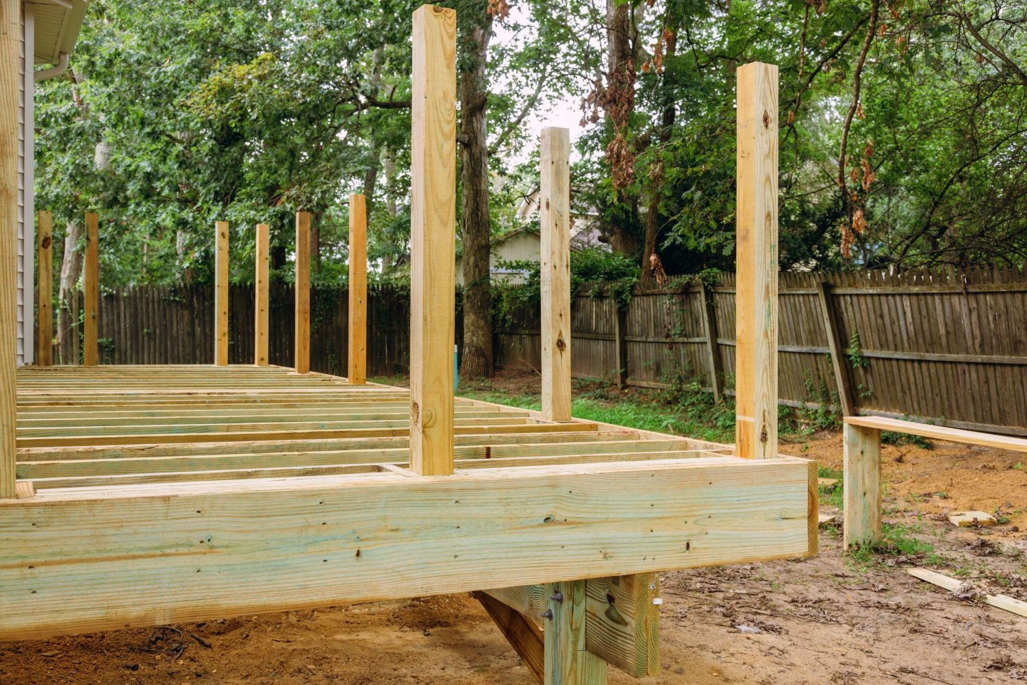 Installing wood floor for patio deck with new wooden decking fragment planks